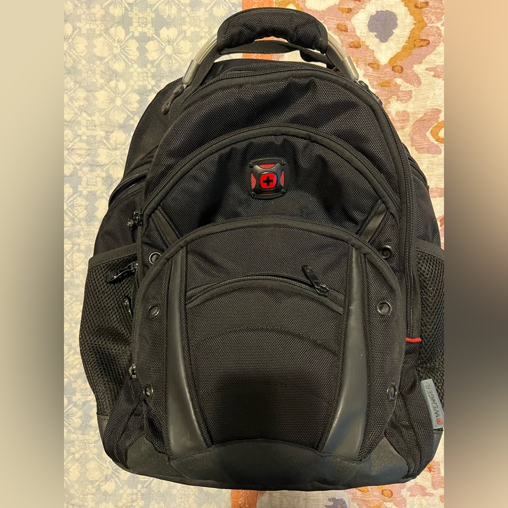 Wenger padded backpack. Ring on one side is missing but that’s about it